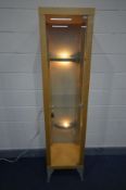 A TALL MODERN BEECH DISPLAY CABINET with light fittings and three glass shelves, width 45cm x