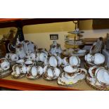 A QUANTITY OF ROYAL ALBERT OLD COUNTRY ROSES TEA, COFFEE AND DESSERT WARES, comprising a three