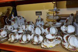 A QUANTITY OF ROYAL ALBERT OLD COUNTRY ROSES TEA, COFFEE AND DESSERT WARES, comprising a three