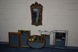 A COLLECTION OF SEVEN VARIOUS MIRRORS to include two modern metal framed mirrors, carved oak