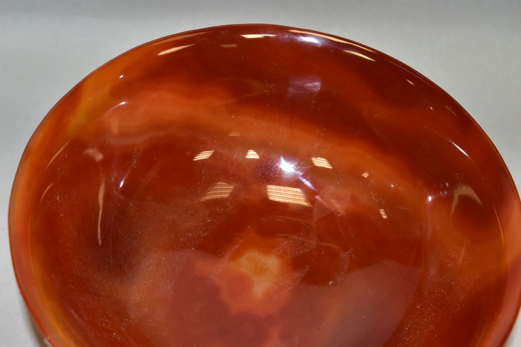 A CHINESE AGATE BOWL, semi translucent striated amber tones, short circular foot, diameter 18.8cm, - Image 4 of 9