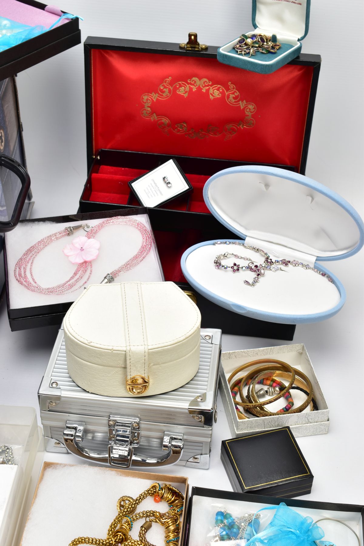 A BOX OF COSTUME JEWELLERY, to include two enamel brooches by Fish, a hinged bangle, various - Image 2 of 10