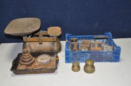 A VINTAGE SET OF GROCERS SCALES, cast iron and bronze weights including Avery, Hulme, Crane, Siddons