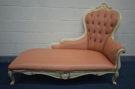 A SILIK CREAM FRAMED CHAISE LONGUE, covered in pink leather and buttoned back, length 160cm (