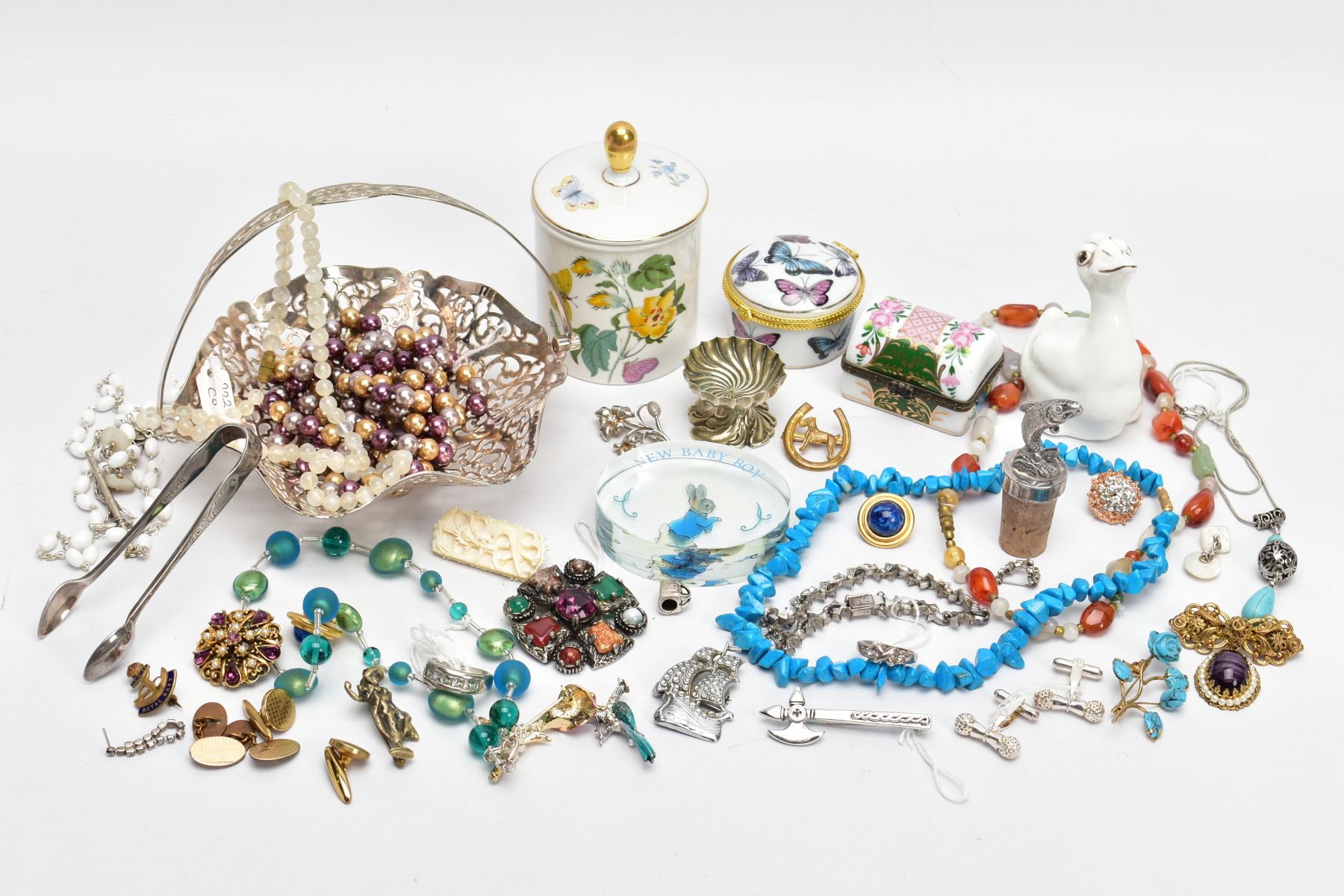 A MIXED TRAY OF CERAMICS, METALWARE AND COSTUME JEWELLERY, to include a Portmerion lidded jar with