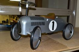 A GREAT GIZMOS CHILDS SIT ON CLASSIC RACING CAR, of steel construction with plastic seat and grille,