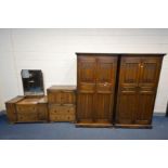 AN OAK LINENFOLD TWO PIECE BEDROOM SUITE, comprising a dressing table with a single mirror and a