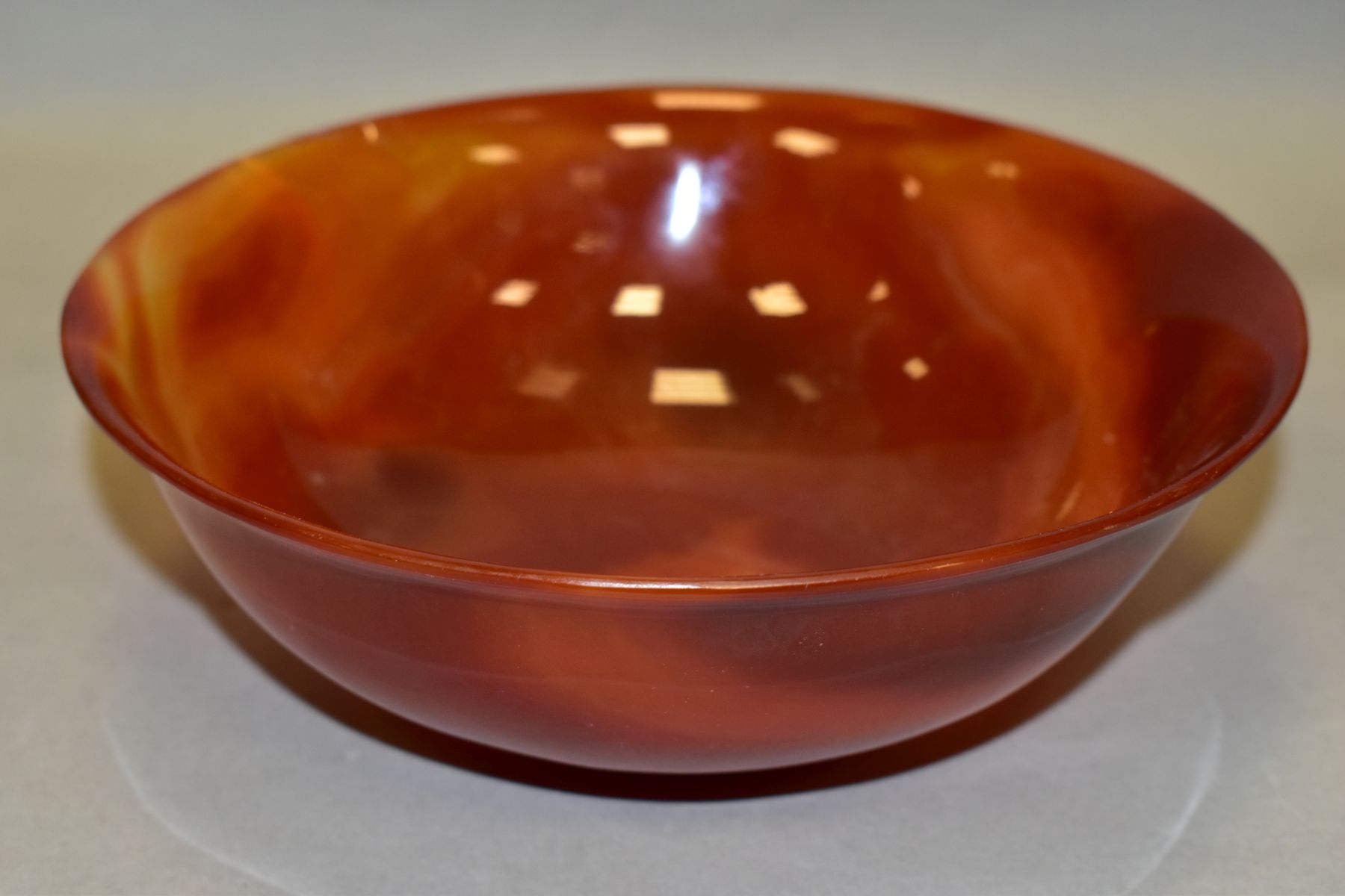A CHINESE AGATE BOWL, semi translucent striated amber tones, short circular foot, diameter 18.8cm, - Image 9 of 9
