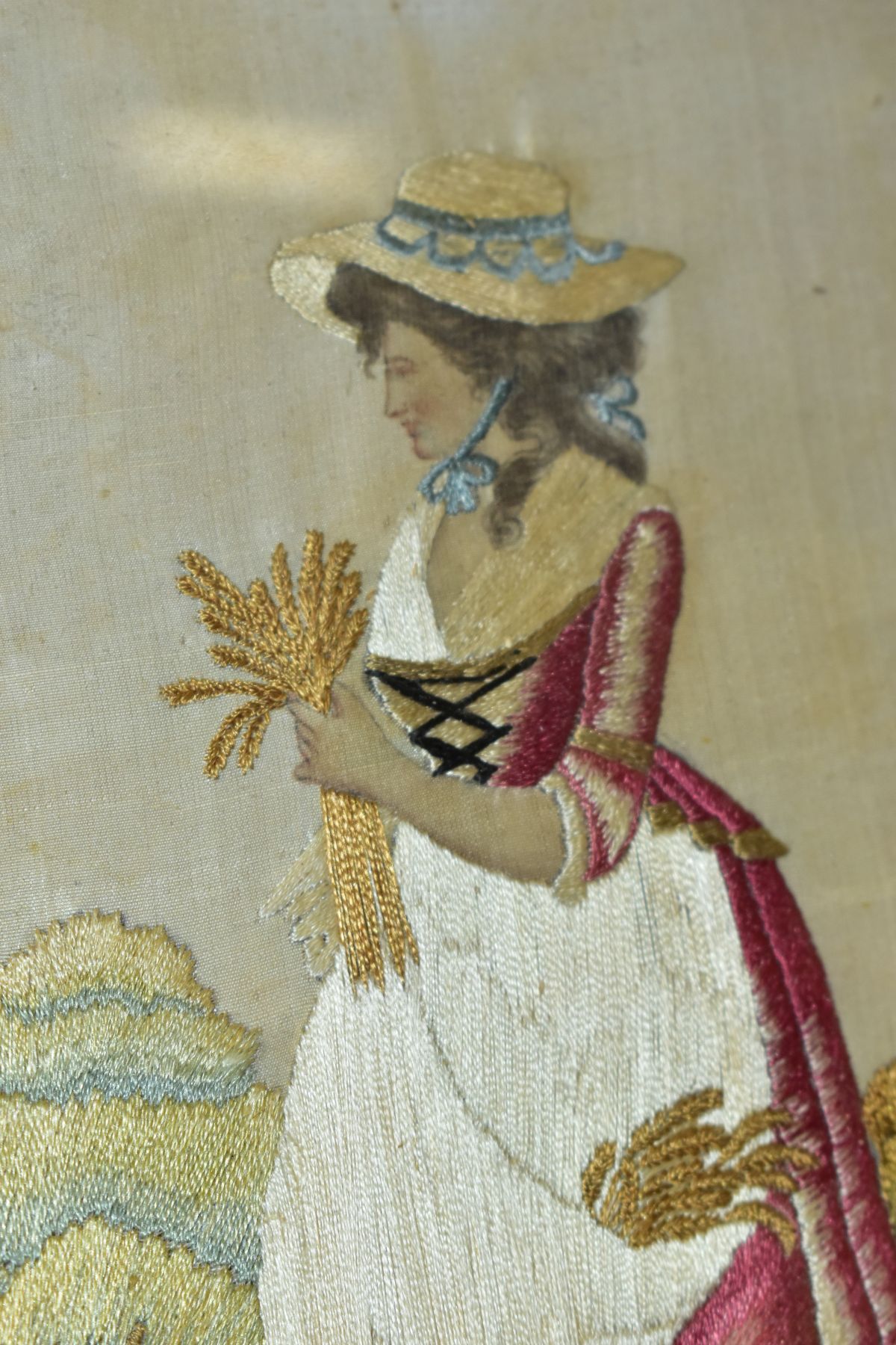 A LATE 18TH CENTURY EMBROIDERED SILKWORK PICTURE OF A LADY HARVESTING CORN, church to the - Image 4 of 5