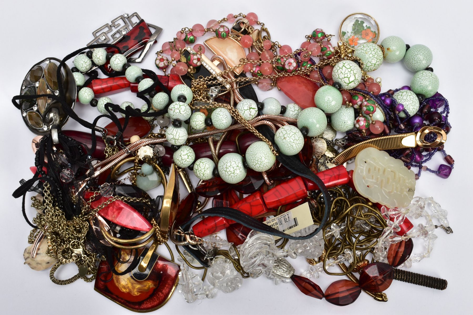 A SELECTION OF COSTUME JEWELLERY, to include a Miracle pendant, a Jaeger multi-chain necklace, an