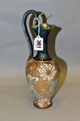 A ROYAL DOULTON SLATERS PATENT STONEWARE EWER, mottled green/blue glazed handle and neck, the