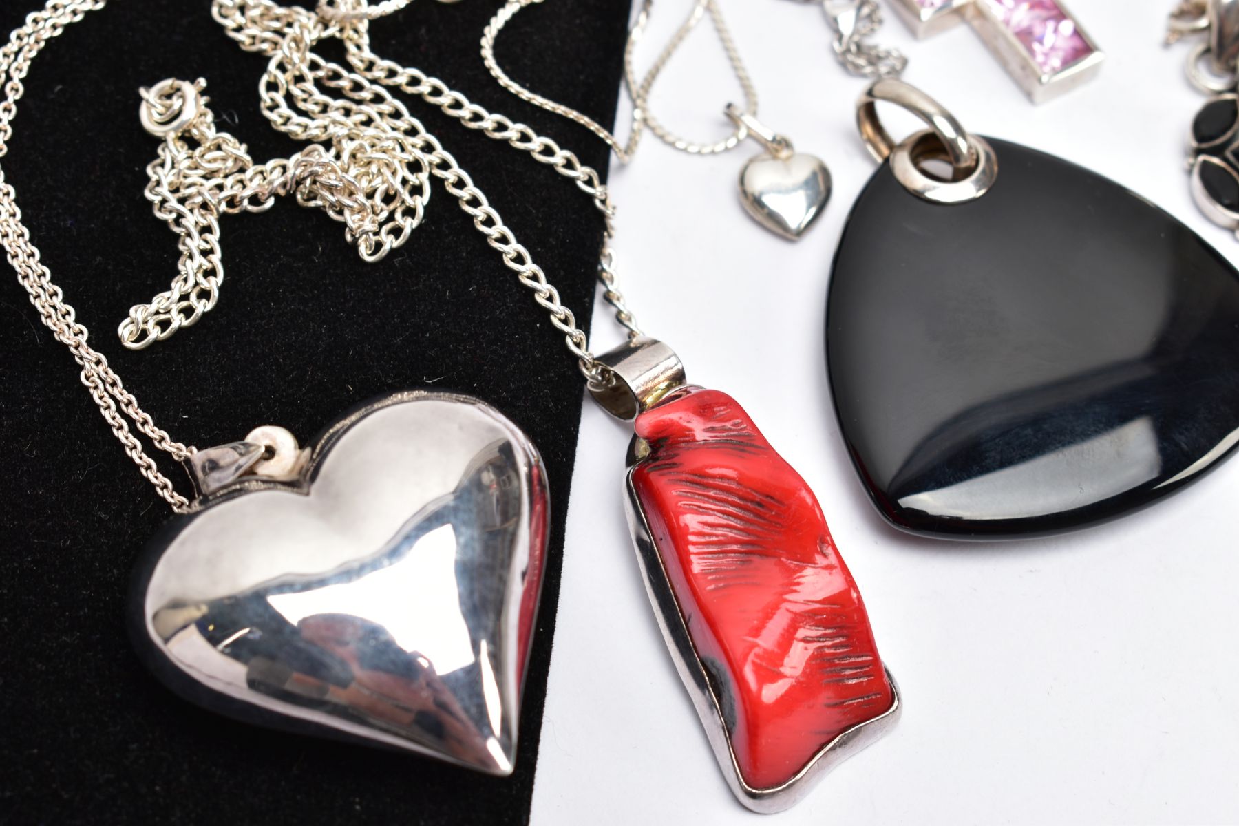 A SELECTION OF PENDANTS, to include a dyed branch coral pendant, a heart pendant, a cross pendant, a - Image 2 of 3