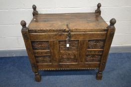 AN ANTIQUE CARVED HARDWOOD MARRIAGE/DOWRY CHEST, width 93cm x depth 55cm x height 91cm (rickety)