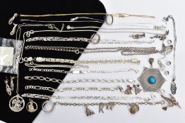A SELECTION OF SILVER AND WHITE METAL JEWELLERY, to include rings, pendants, bracelets, necklaces,