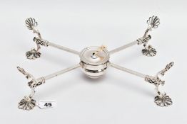 A GEORGE III SILVER AJUSTABLE CROSS PLATE WARMER, standing on four retractable feet of open worked