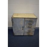 A VINTAGE INDUSTRIAL CABINET, cream enamel top, single cupboard door besides five drawers, width