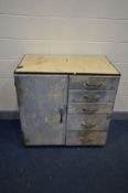 A VINTAGE INDUSTRIAL CABINET, cream enamel top, single cupboard door besides five drawers, width