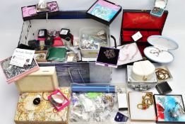 A BOX OF COSTUME JEWELLERY, to include two enamel brooches by Fish, a hinged bangle, various