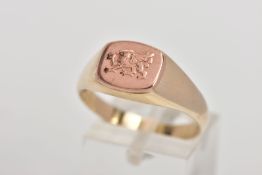 A 9CT GOLD BI-COLOUR CLOGAU SIGNET RING, the 'Welsh Dragon' design in rose gold to the central panel