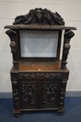 AN OAK CONTINENTAL BUFFET WITH CUPBOARD, incorporating some 19th century timbers, with a mixture