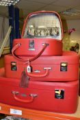 A GRADUATED SET OF THREE TRAVEL SUITCASES by Pukka luggage,largest size approximately width 63cm x