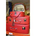 A GRADUATED SET OF THREE TRAVEL SUITCASES by Pukka luggage,largest size approximately width 63cm x