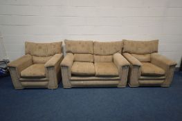 A BROWN UPHOLSTERED THREE PIECE LOUNGE SUITE, comprising a sofa, length 142cm and a pair of