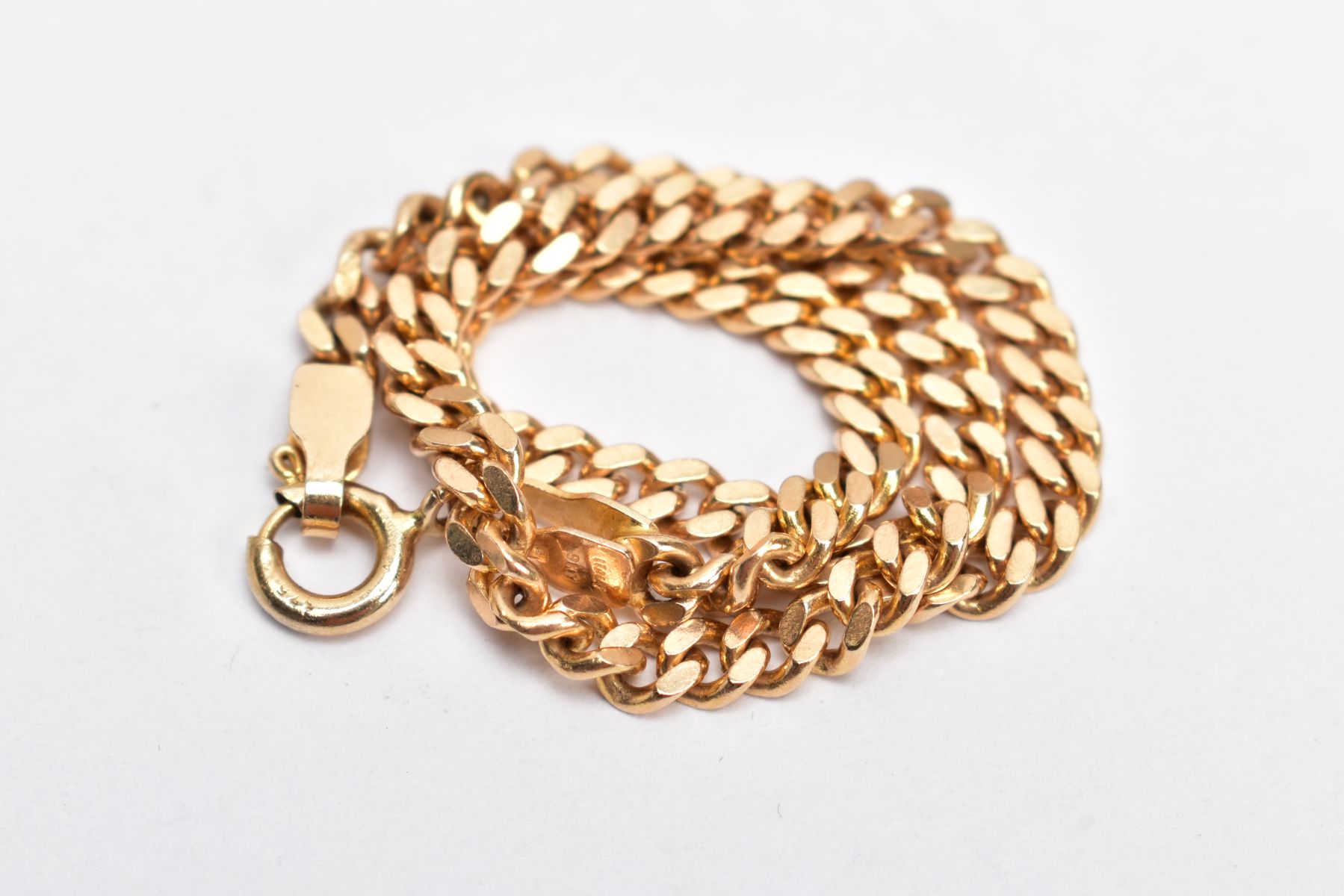 A 9CT GOLD CURB LINK BRACELET, fitted with a spring clasp hallmarked 9ct gold London import, - Image 2 of 2