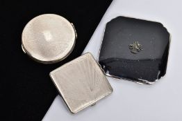 THREE COMPACTS, to include a 1960's silver Kigu of circular outline, with silver hallmark for London