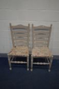 A SET OF EIGHT PAINTED LADDER BACK DINING CHAIRS (picture of two chairs, six in storage)