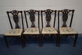 A SET OF FOUR MAHOGANY CHIPPENDALE STYLE DINING CHAIR, with needlework drop in seat pads