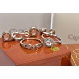 THREE ITEMS OF SILVER CLOGAU JEWELLERY, to include a cluster ring set with a central circular