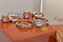 THREE ITEMS OF SILVER CLOGAU JEWELLERY, to include a cluster ring set with a central circular