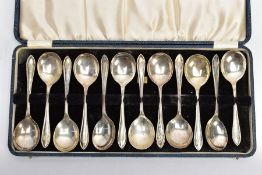 A CASED COMPLETE SET OF TWELVE FRUIT SPOONS, with a tapered treaded point to the handle, engraved '
