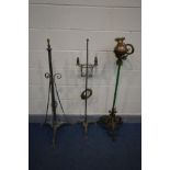 THREE VARIOUS VINTAGE WROUGHT IRON STANDARD LAMPS of various styles and ages