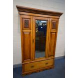 AN EDWARDIAN SATINWOOD WARDROBE, single bevelled edge mirror door, above a single drawer, width