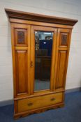 AN EDWARDIAN SATINWOOD WARDROBE, single bevelled edge mirror door, above a single drawer, width