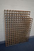 A LARGE WINE RACK, width 119cm x depth 24cm x height 158cm (Sd and rusted)