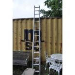 AN ALUMINIUM DOUBLE EXTENSION LADDER with 14 rungs to each 3.5m section