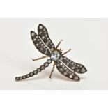 A DRAGONFLY GEM BROOCH, designed as a central oval blue topaz body and circular blue topaz tail, the