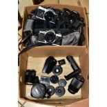 A BOX OF PHOTOGRAPHY RELATED ITEMS, comprising three SLR cameras, Olympus OM-1N, Olympus OM-2N and
