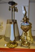 TWO TABLE LAMPS WITH GILT METAL MOUNTS, comprising a twin light lamp on a white glazed porcelain