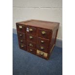 A VINTAGE STAINED PINE TWELVE DRAWER INDEX CABINET, width 51cm x depth 40cm x height 43cm (repair to