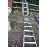 AN ALUMINIUM STEP LADDER 190cm high and a four section collapsible ladder 90cm each section (