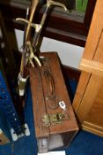 A VINTAGE BROWN LEATHER SUITCASE WITH KEY, the two metal clasps stamped '?Boobakr H? Karachi 6