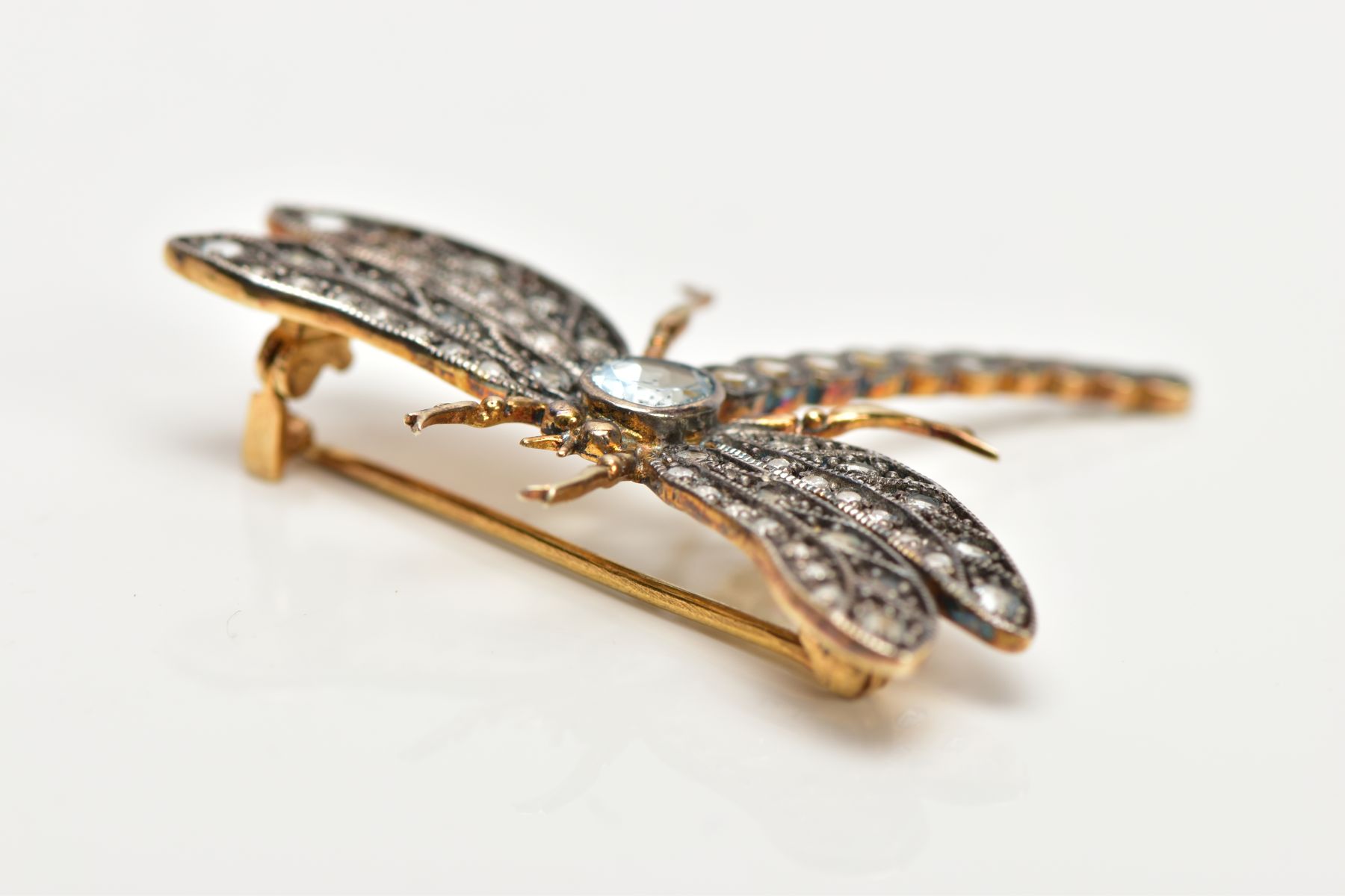 A DRAGONFLY GEM BROOCH, designed as a central oval blue topaz body and circular blue topaz tail, the - Image 3 of 3