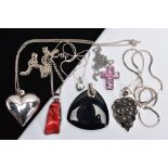 A SELECTION OF PENDANTS, to include a dyed branch coral pendant, a heart pendant, a cross pendant, a