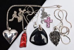 A SELECTION OF PENDANTS, to include a dyed branch coral pendant, a heart pendant, a cross pendant, a