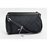 A SMALL BLACK GUCCI BAG, the monogram canvas with brass fittings and zip closure, inner label