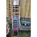 A SET OF WOODEN STEP LADDERS 197cm high, a set of metal steps, a lawn seeder and a hose reel (4)